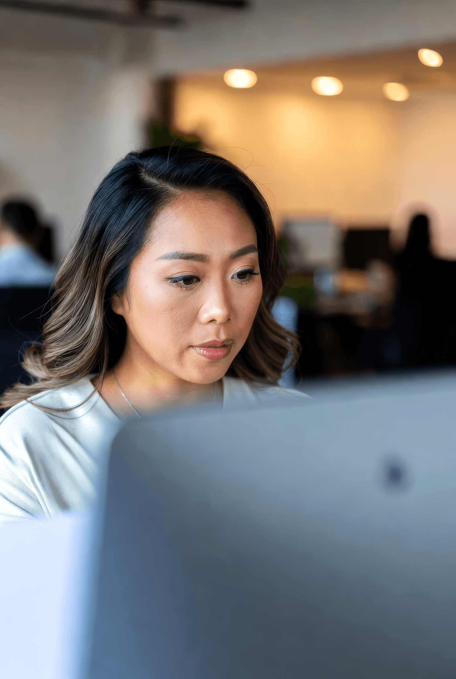 Professional reviewing work in office environment